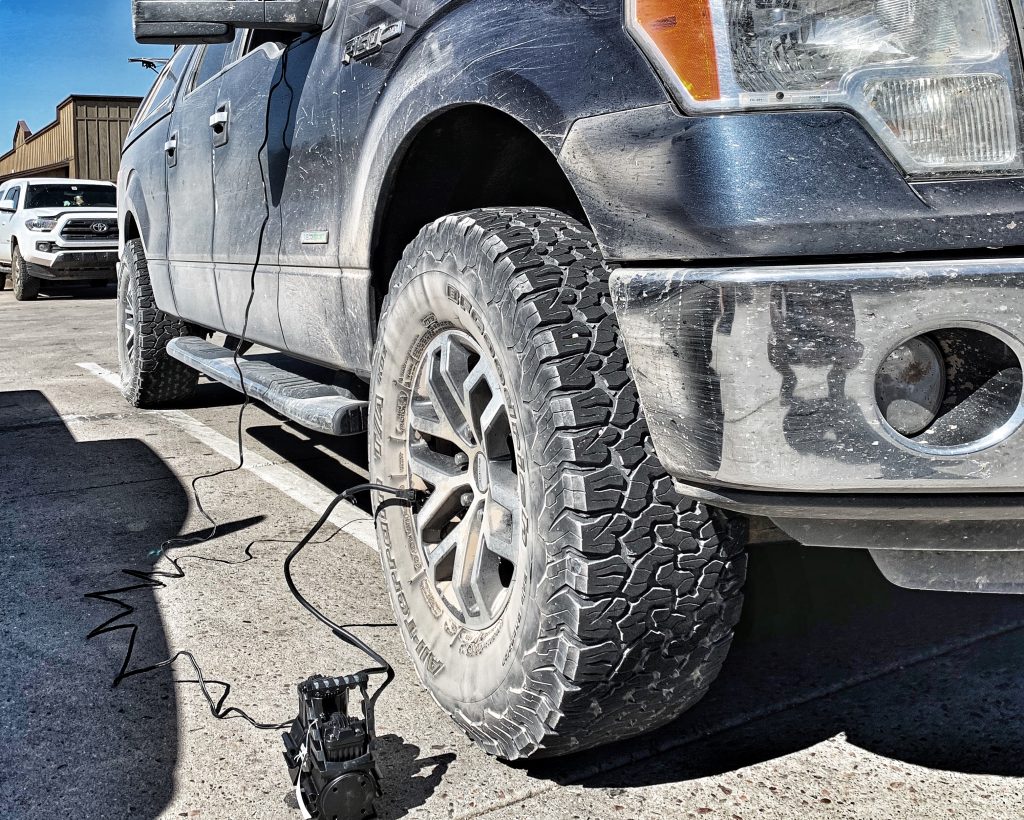 xplrcreate air compressor inflating tires after air down for offroad driving