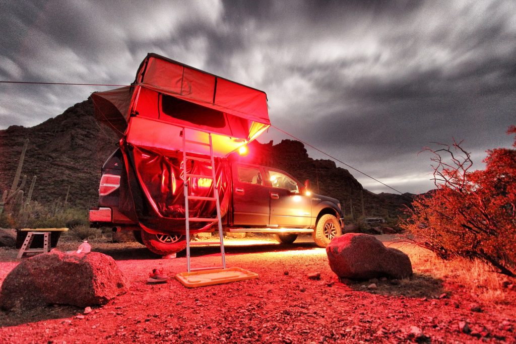 Night photo of Overland setup at Organ Pipe Cactus National Monument. 2014 F150 with Raptor wheels and 35in tires